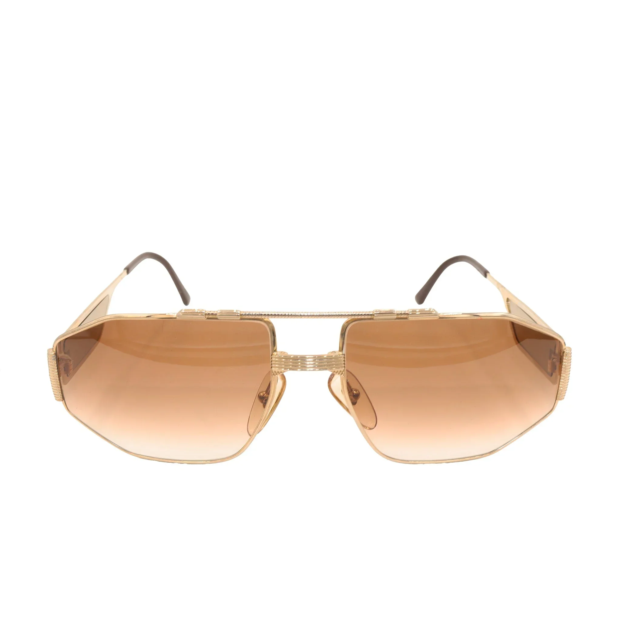 نظارات شمسية ذهبية من CHRISTIAN DIOR.